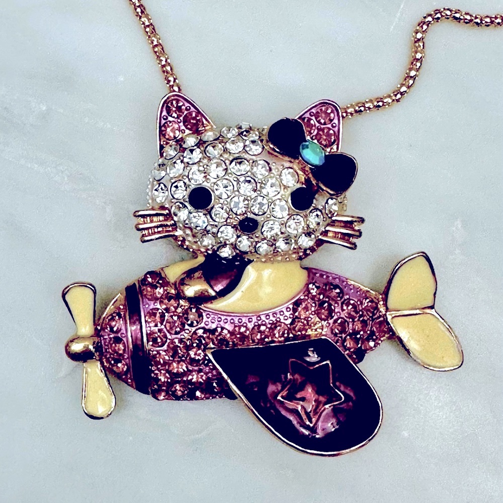 Betsey Johnson Hello Kitty airplane with multi- color rhinestones Necklace.